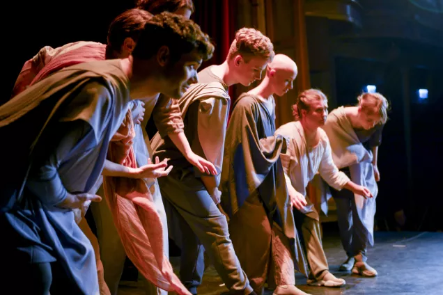 Students on stage taking a bow. Photo. 